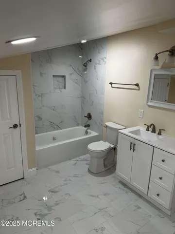 an empty room with wooden floor