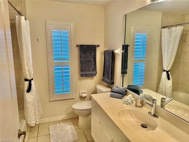 a room with furniture and wooden floor