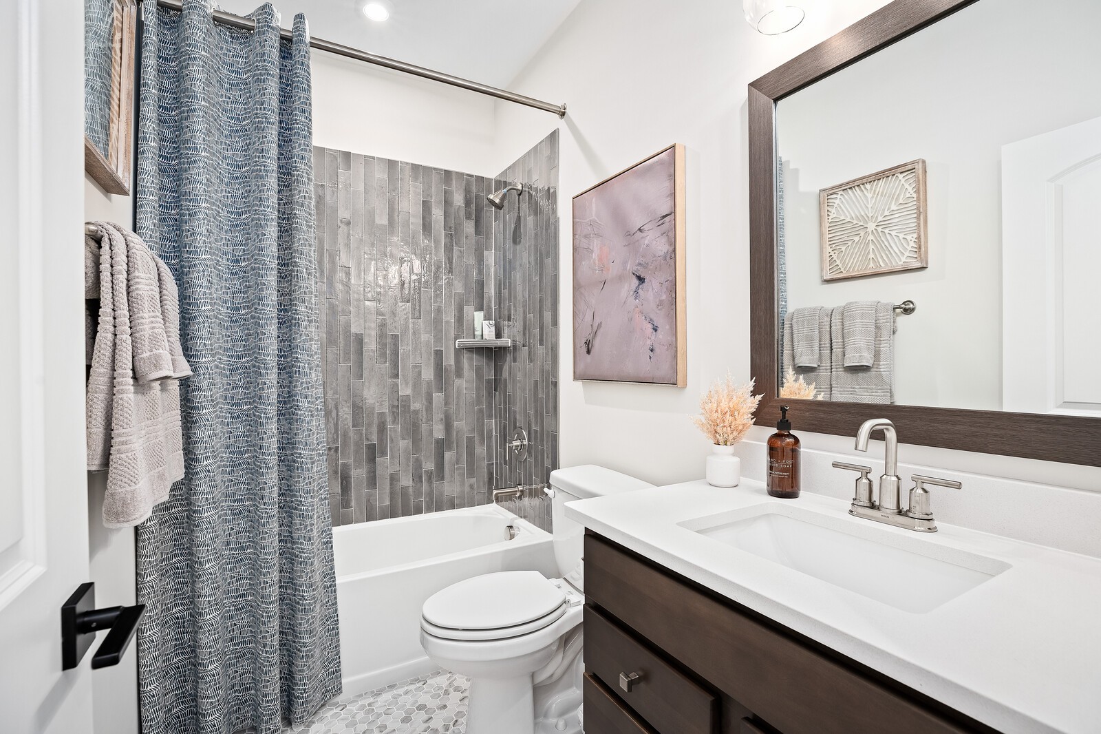 7689 Hatcher Heights Drive Fairview, TN 37062 - Photo 13 of 47 a bathroom with a double vanity sink toilet mirror and shower