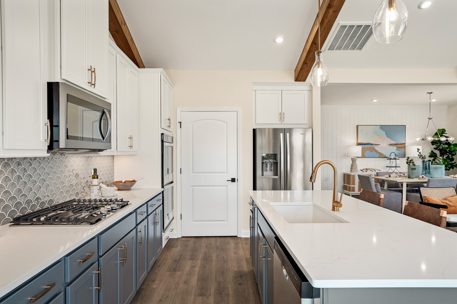 7689 Hatcher Heights Drive Fairview, TN 37062 - Photo 23 of 47 a kitchen with kitchen island a sink appliances and cabinets