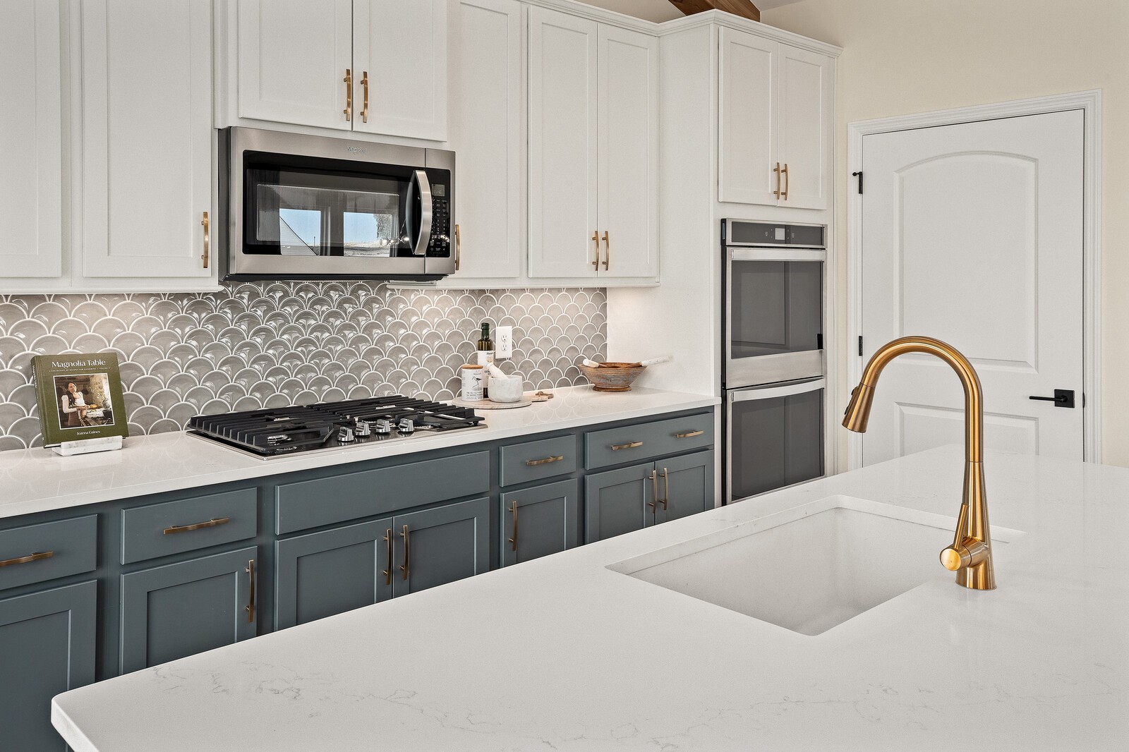 7689 Hatcher Heights Drive Fairview, TN 37062 - Photo 24 of 47 a kitchen with a sink a stove and cabinets