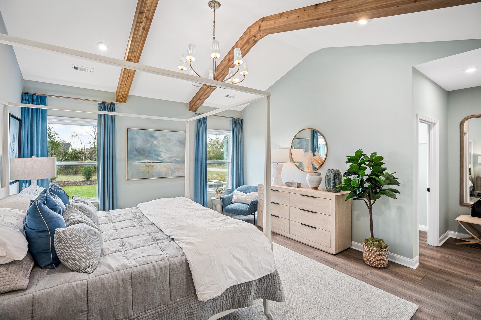7689 Hatcher Heights Drive Fairview, TN 37062 - Photo 27 of 47 a bedroom with a bed table flowerpot and window