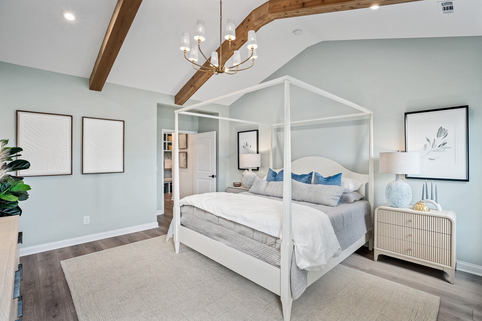 7689 Hatcher Heights Drive Fairview, TN 37062 - Photo 28 of 47 a bedroom with a bed and a chandelier