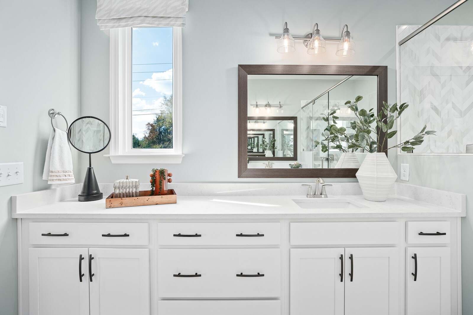 7689 Hatcher Heights Drive Fairview, TN 37062 - Photo 31 of 47 a bathroom with a sink and a mirror