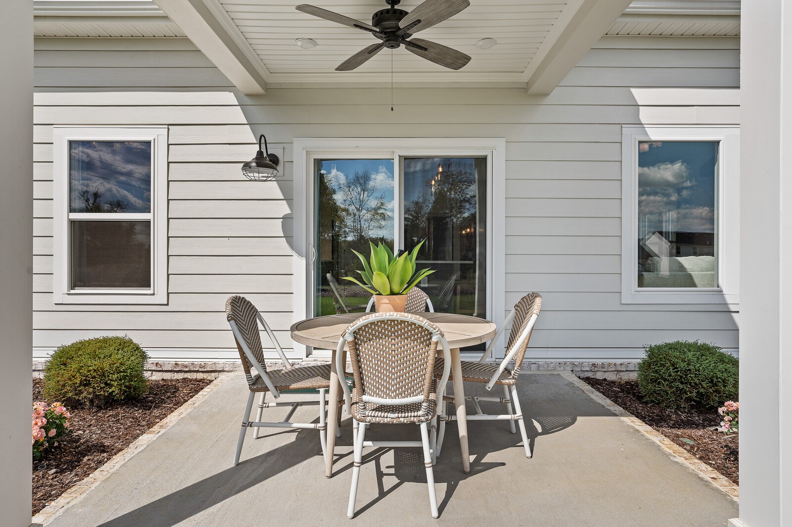 7689 Hatcher Heights Drive Fairview, TN 37062 - Photo 44 of 47 a view of a patio with table and chairs and potted plants