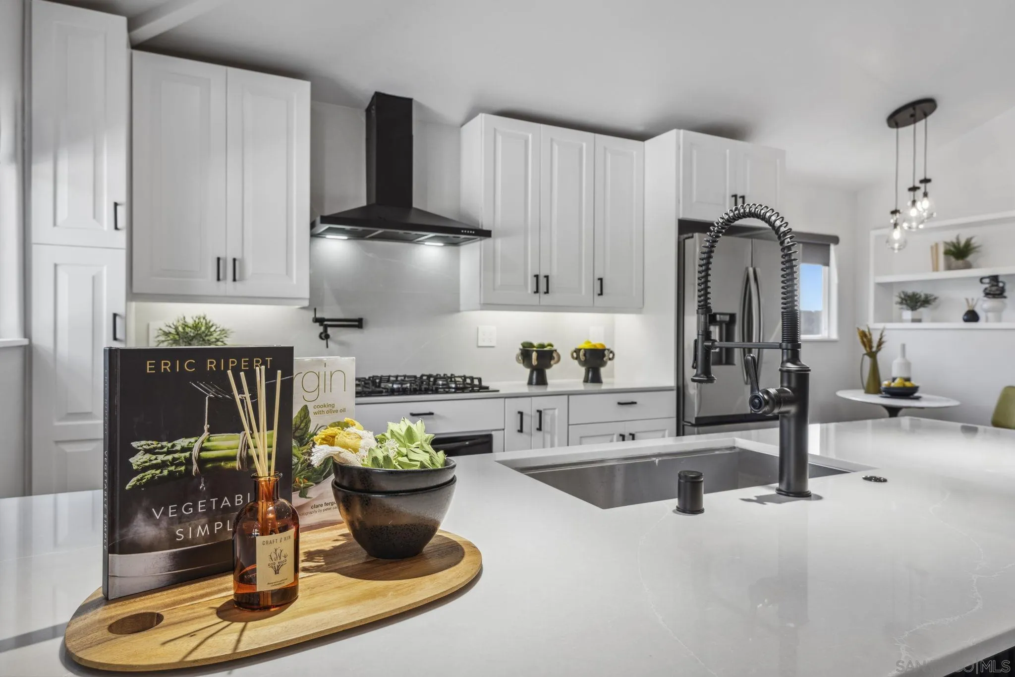 2026 Estero Street Oceanside, CA 92054 - Photo 13 of 72 a kitchen with stainless steel appliances granite countertop a sink a stove and a refrigerator