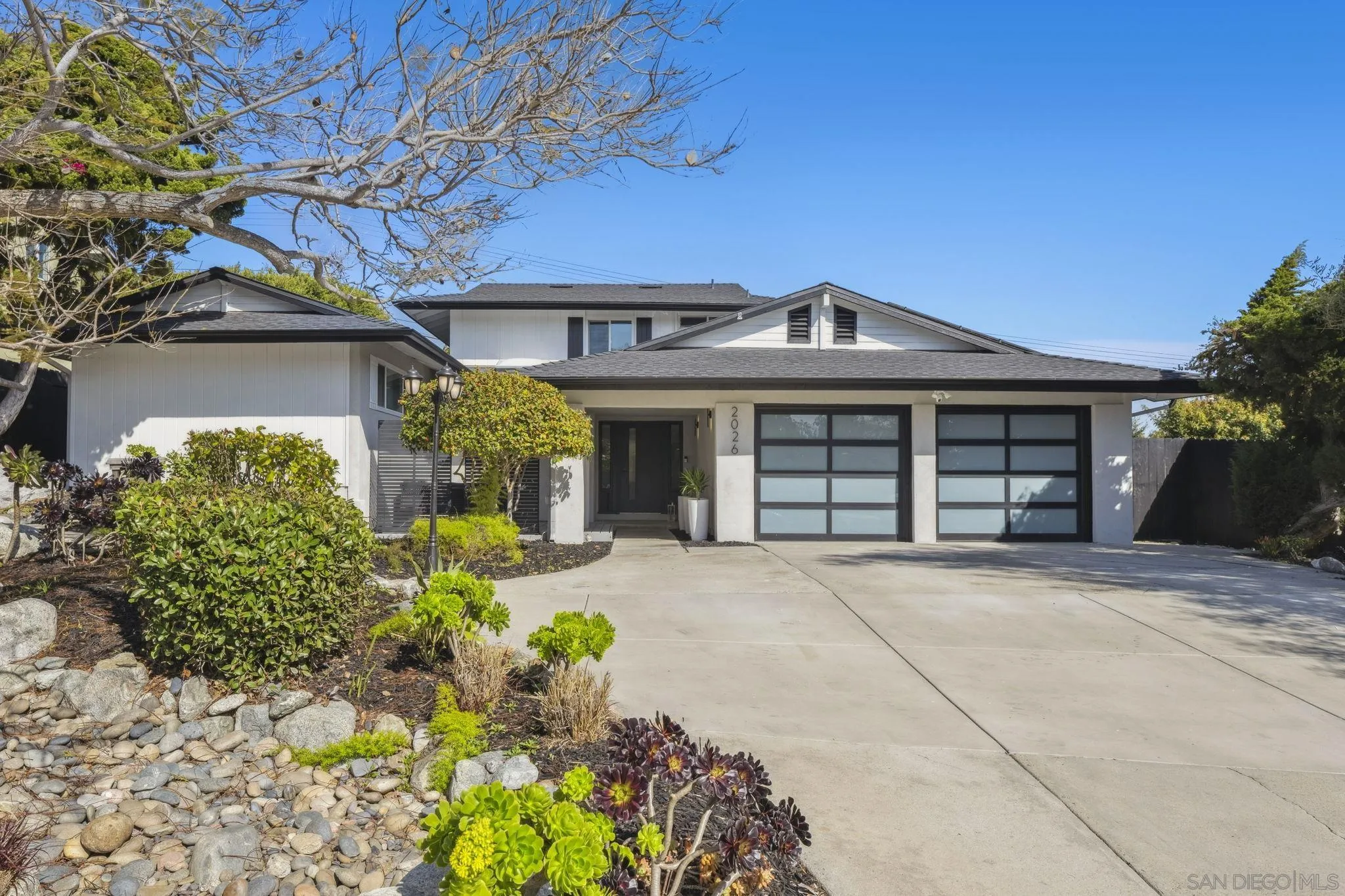 2026 Estero Street Oceanside, CA 92054 - Photo 2 of 72 front view of a house with a yard