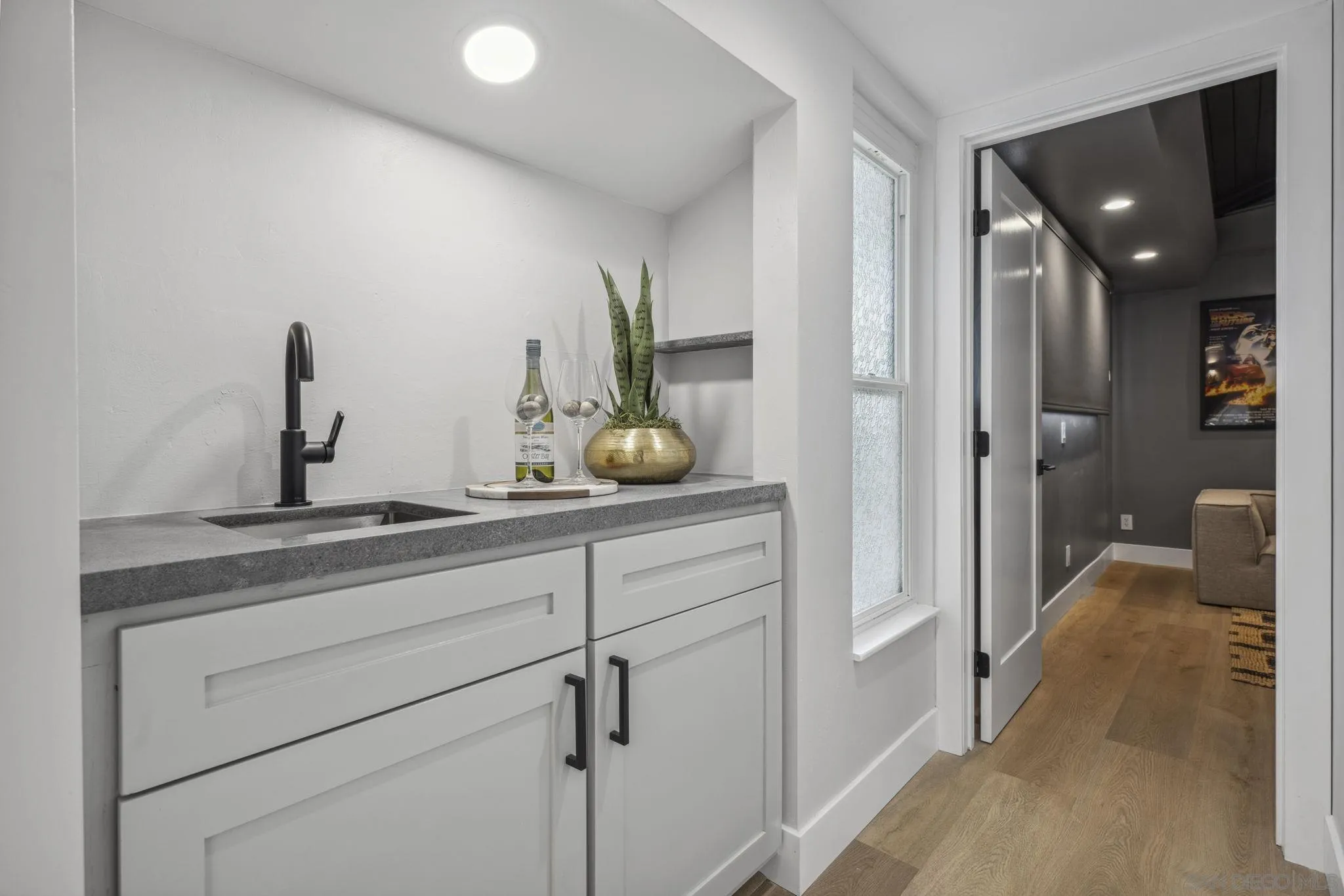 2026 Estero Street Oceanside, CA 92054 - Photo 26 of 72 a view of bathroom with a sink mirror and shower