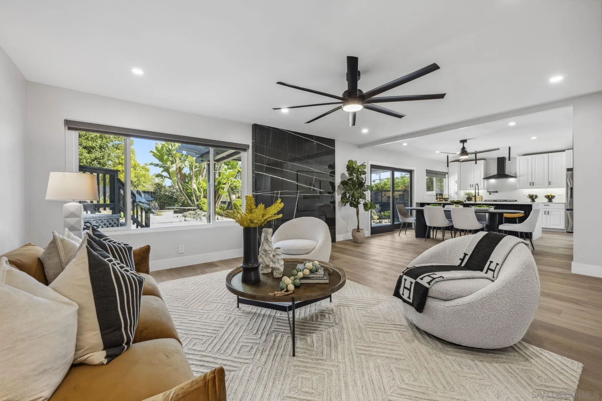 2026 Estero Street Oceanside, CA 92054 - Photo 3 of 72 a living room with furniture and a large window