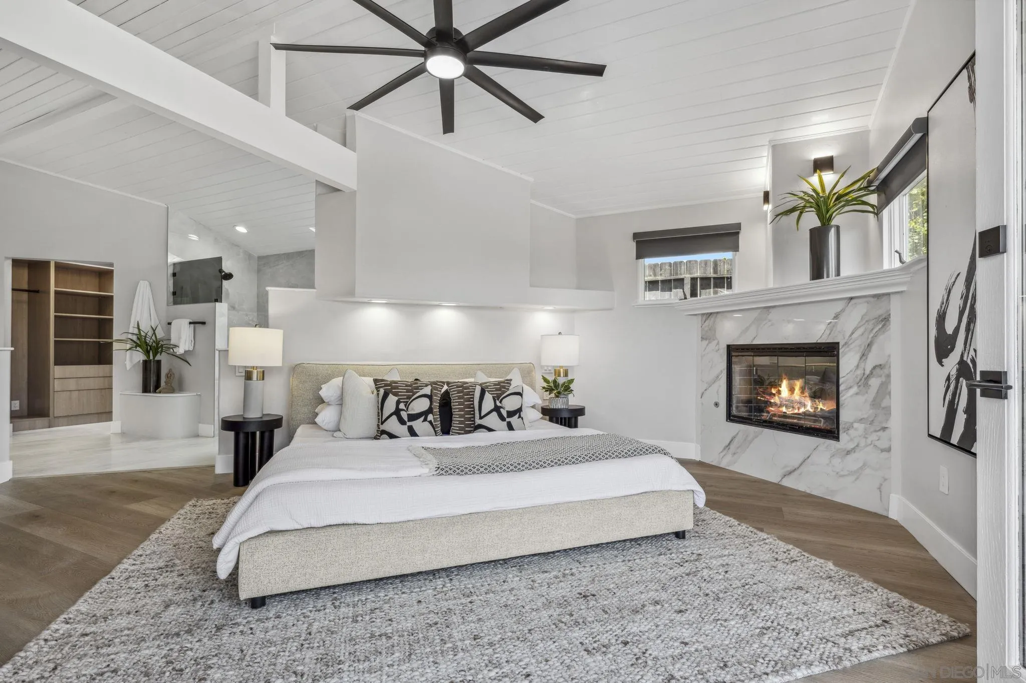 2026 Estero Street Oceanside, CA 92054 - Photo 32 of 72 a bed room with a bed and a fireplace