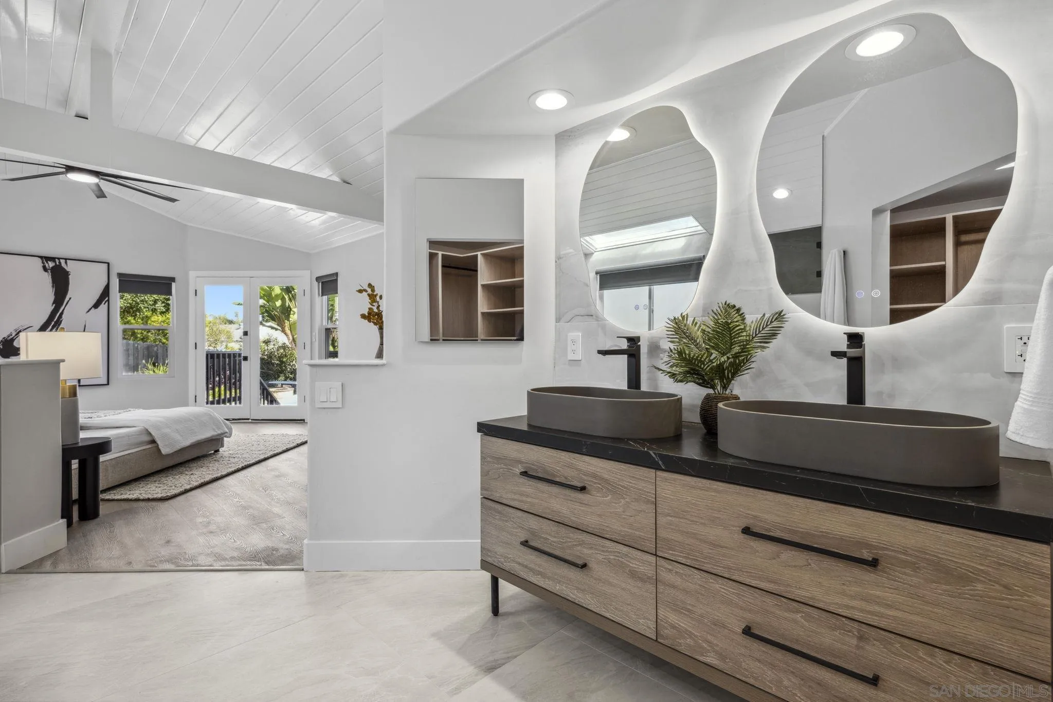 2026 Estero Street Oceanside, CA 92054 - Photo 35 of 72 a living room with furniture and a potted plant