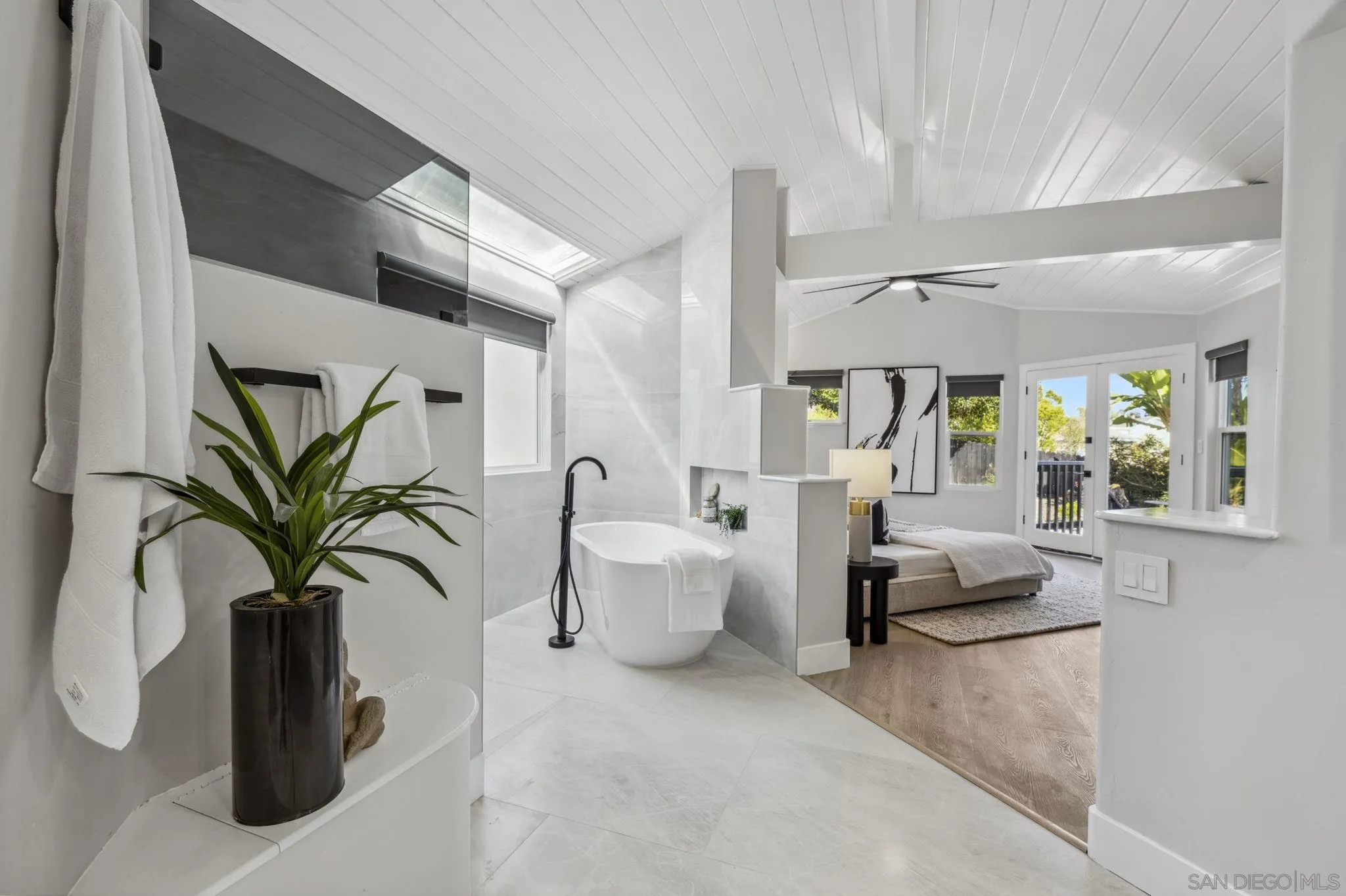 2026 Estero Street Oceanside, CA 92054 - Photo 36 of 72 a living room with furniture and a potted plant