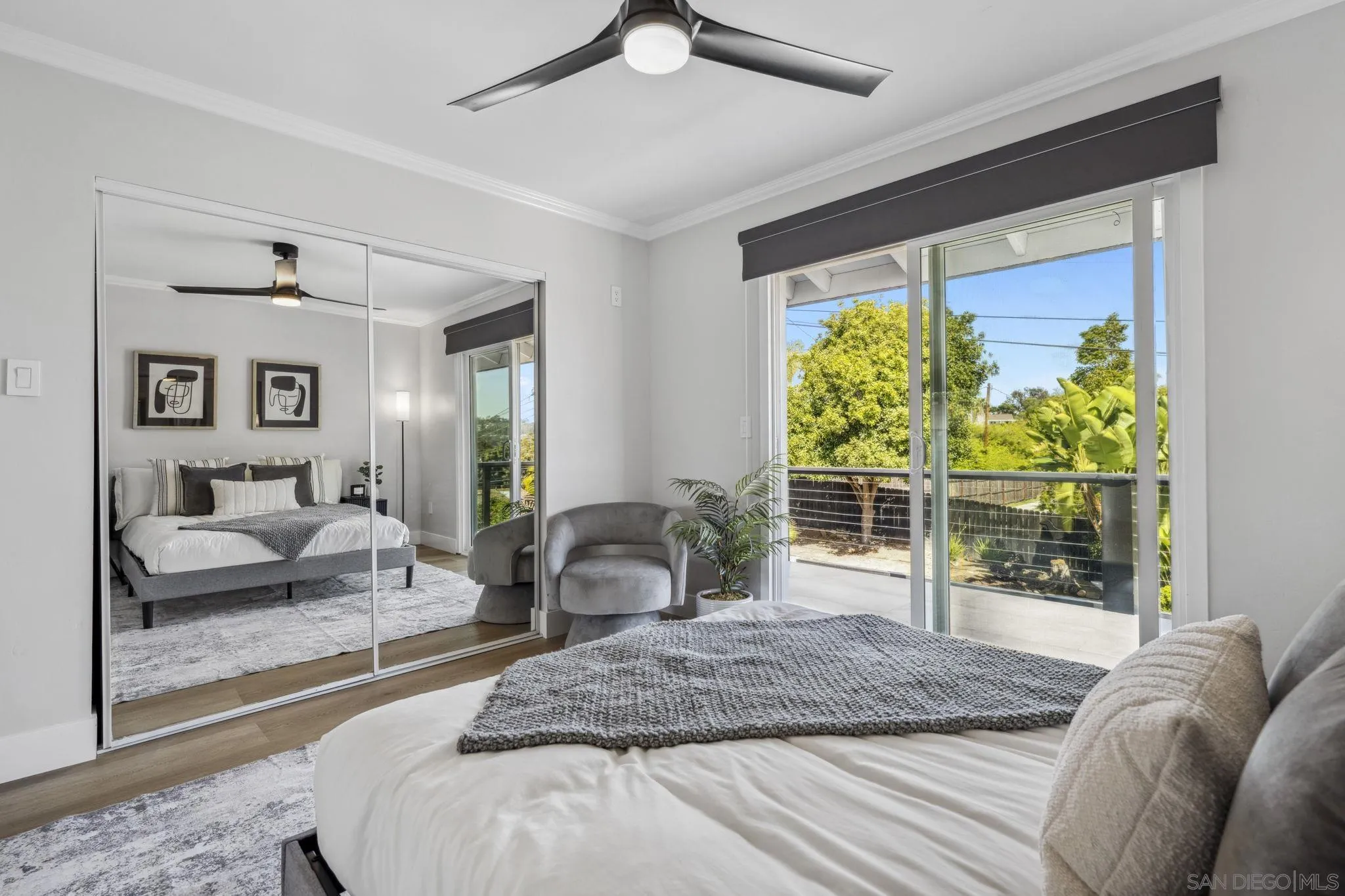 2026 Estero Street Oceanside, CA 92054 - Photo 51 of 72 a bedroom with a bed and a large window