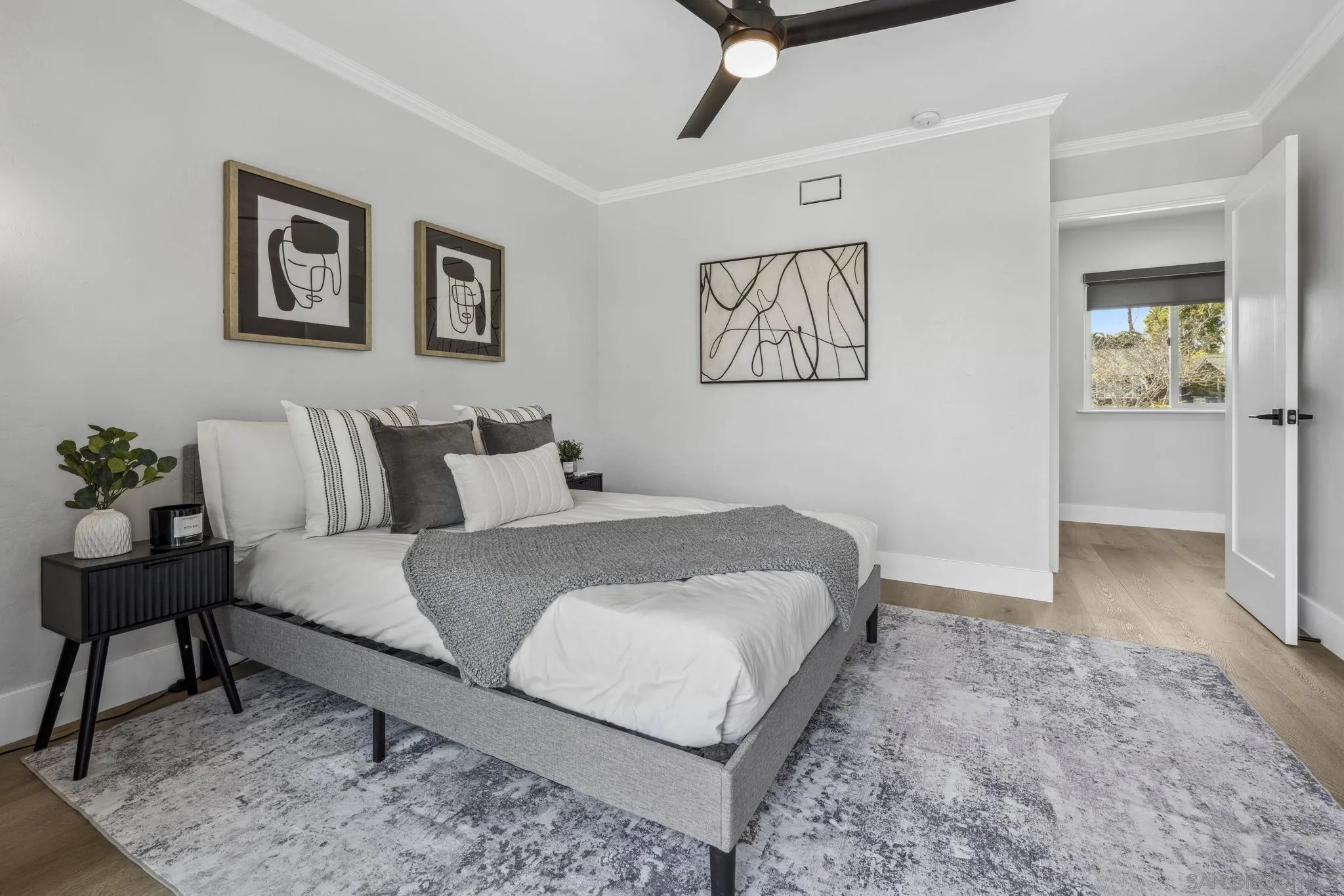 2026 Estero Street Oceanside, CA 92054 - Photo 52 of 72 a bedroom with a bed and a table