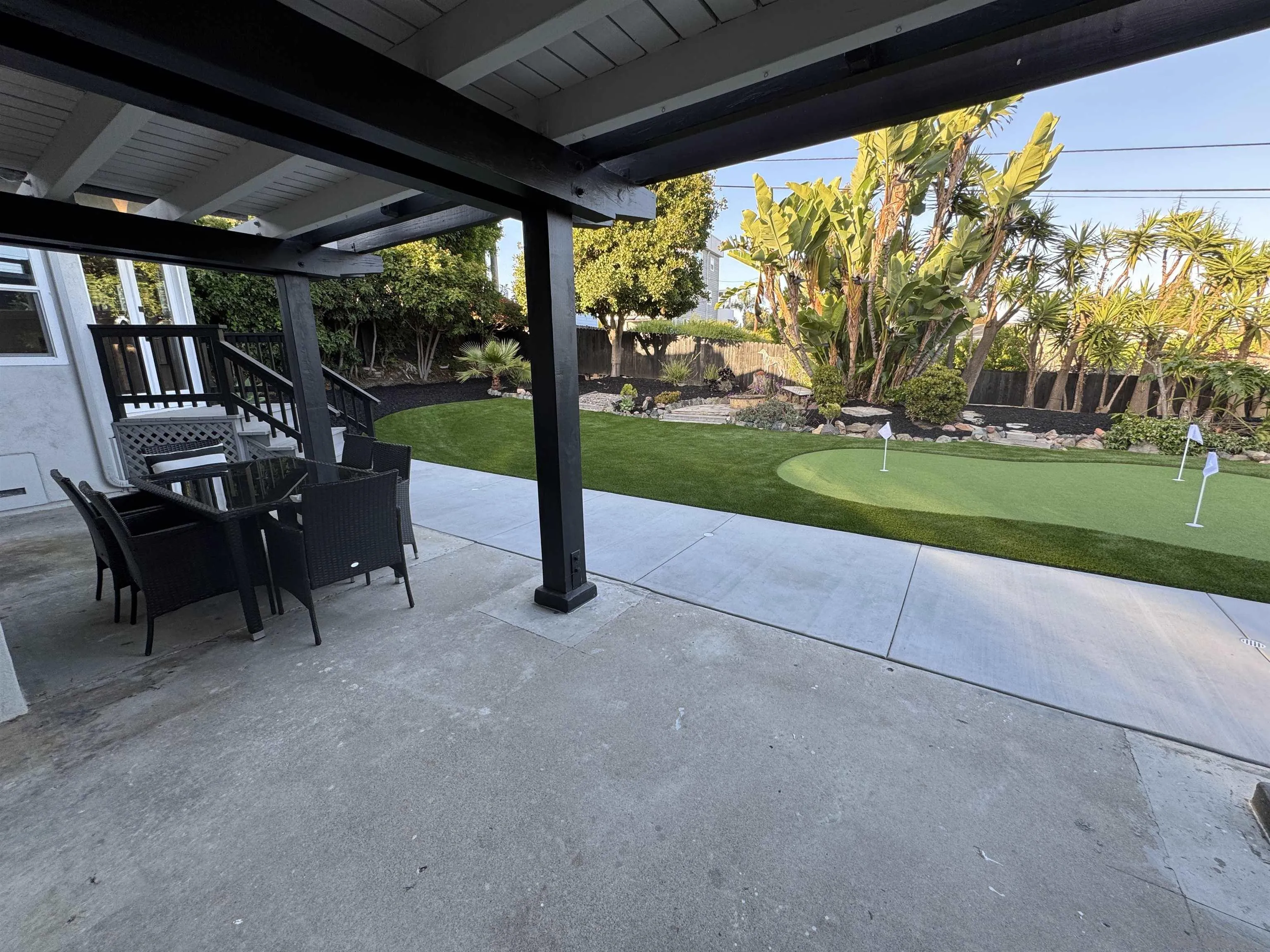 2026 Estero Street Oceanside, CA 92054 - Photo 57 of 72 a view of a porch with furniture and garden