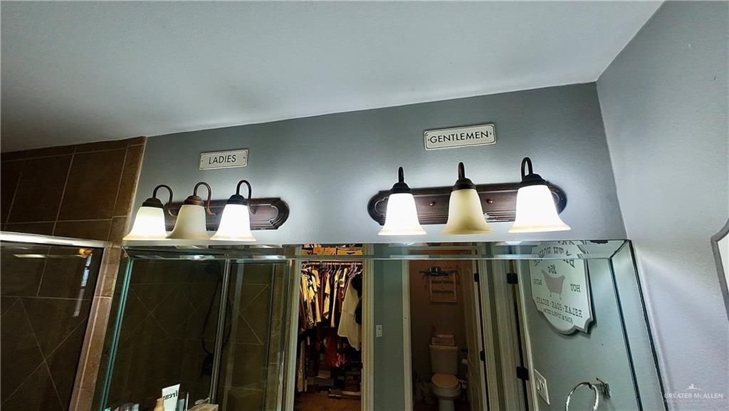 412 Rio Nueces San Juan, TX 78589 - Photo 19 of 19 a bathroom with a sink and mirror