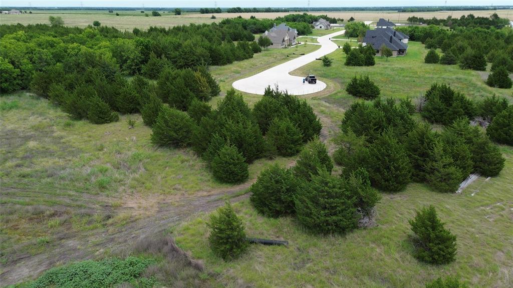 Tbv Evergreen Way Nevada, TX 75173 - Photo 2 of 4 an aerial view of a house with a yard