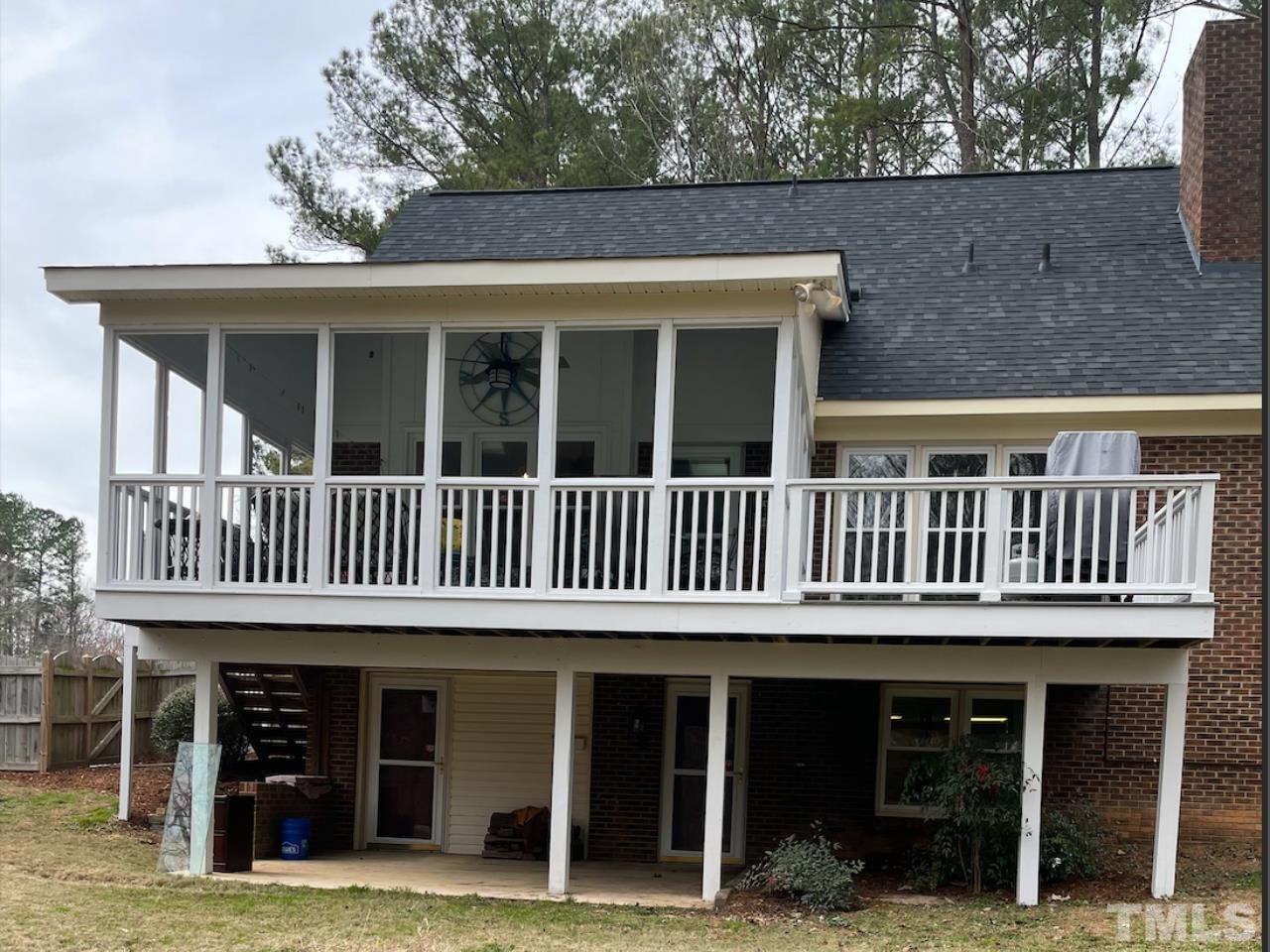 7101 Denlee Road Raleigh, NC 27603 - Photo 16 of 32 front view of a house with a deck