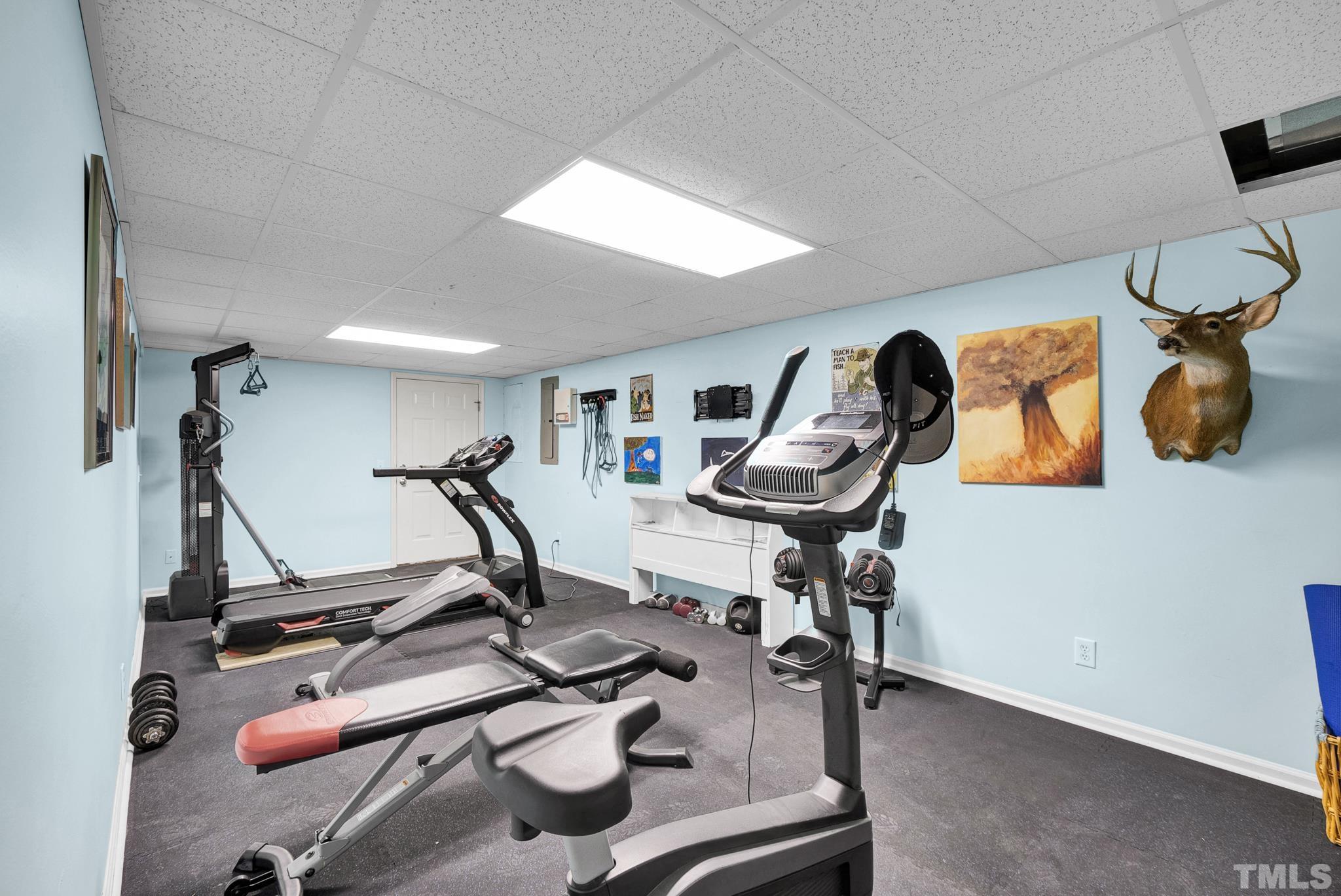 7101 Denlee Road Raleigh, NC 27603 - Photo 24 of 32 a view of a room with gym equipment