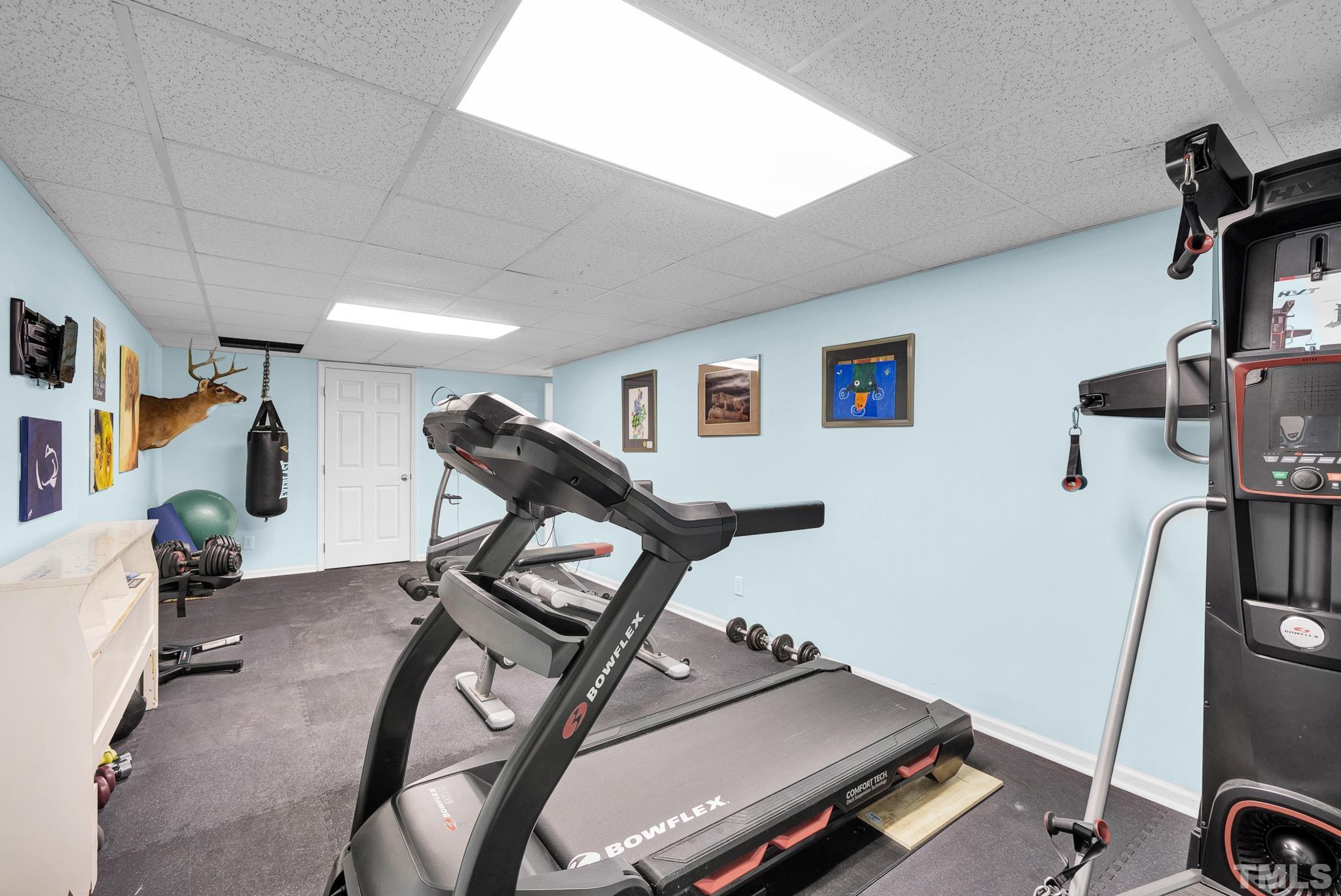 7101 Denlee Road Raleigh, NC 27603 - Photo 25 of 32 a room with gym equipment