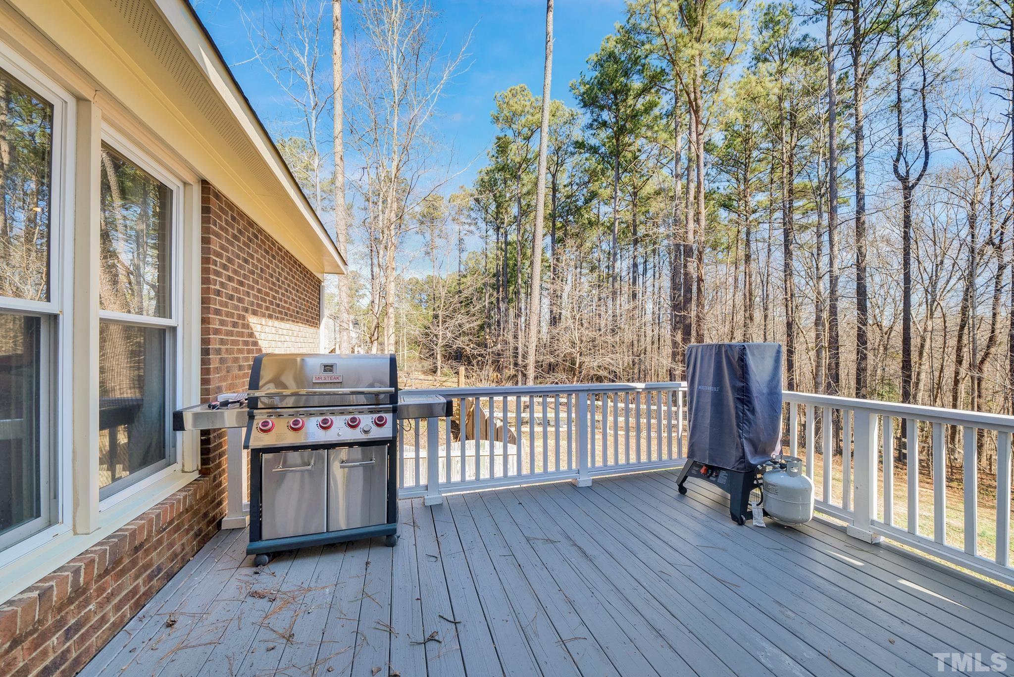 7101 Denlee Road Raleigh, NC 27603 - Photo 28 of 32 a view of outdoor space with deck and furniture