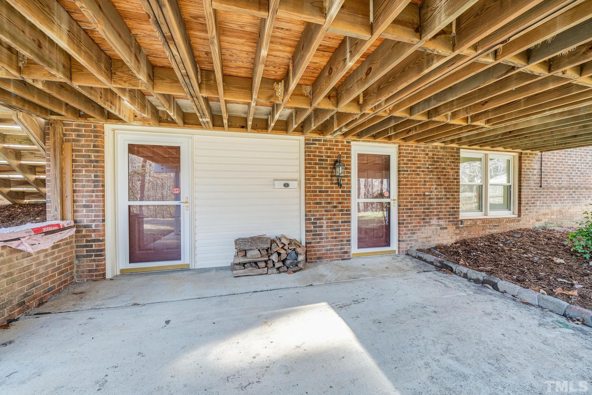 7101 Denlee Road Raleigh, NC 27603 - Photo 31 of 32 a view of a room with wooden walls