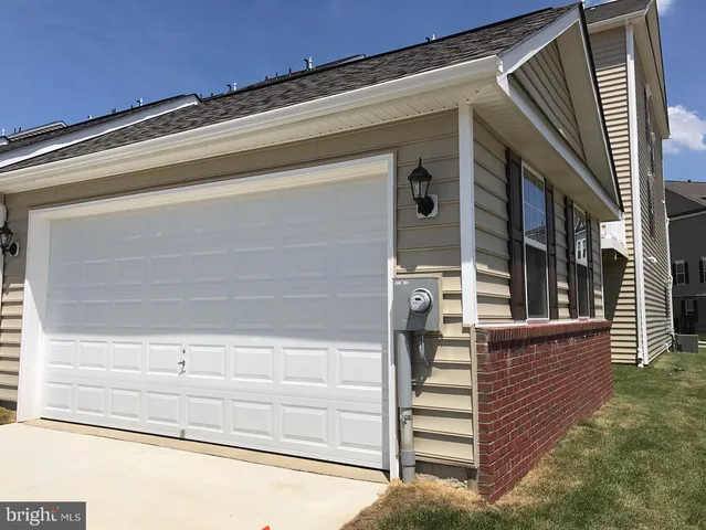 a front view of a house with a window
