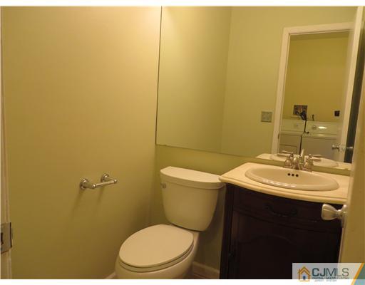36 Gable Court Old Bridge, NJ 07747 - Photo 9 of 22 a bathroom with a sink and a mirror