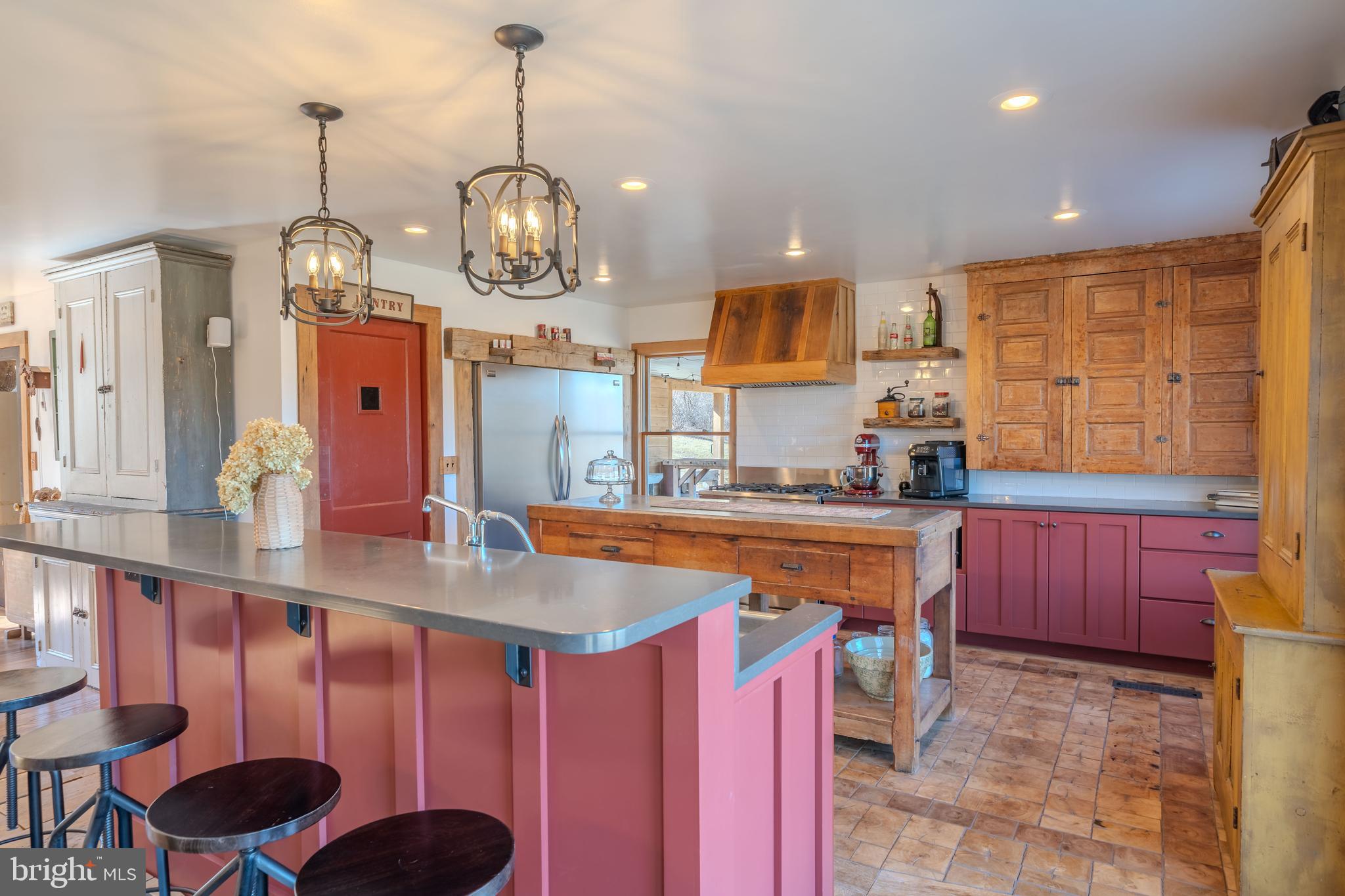 651 Robinson Road Newport, PA 17074 - Photo 12 of 87 a kitchen with stainless steel appliances granite countertop a sink a stove top oven a counter space and cabinets