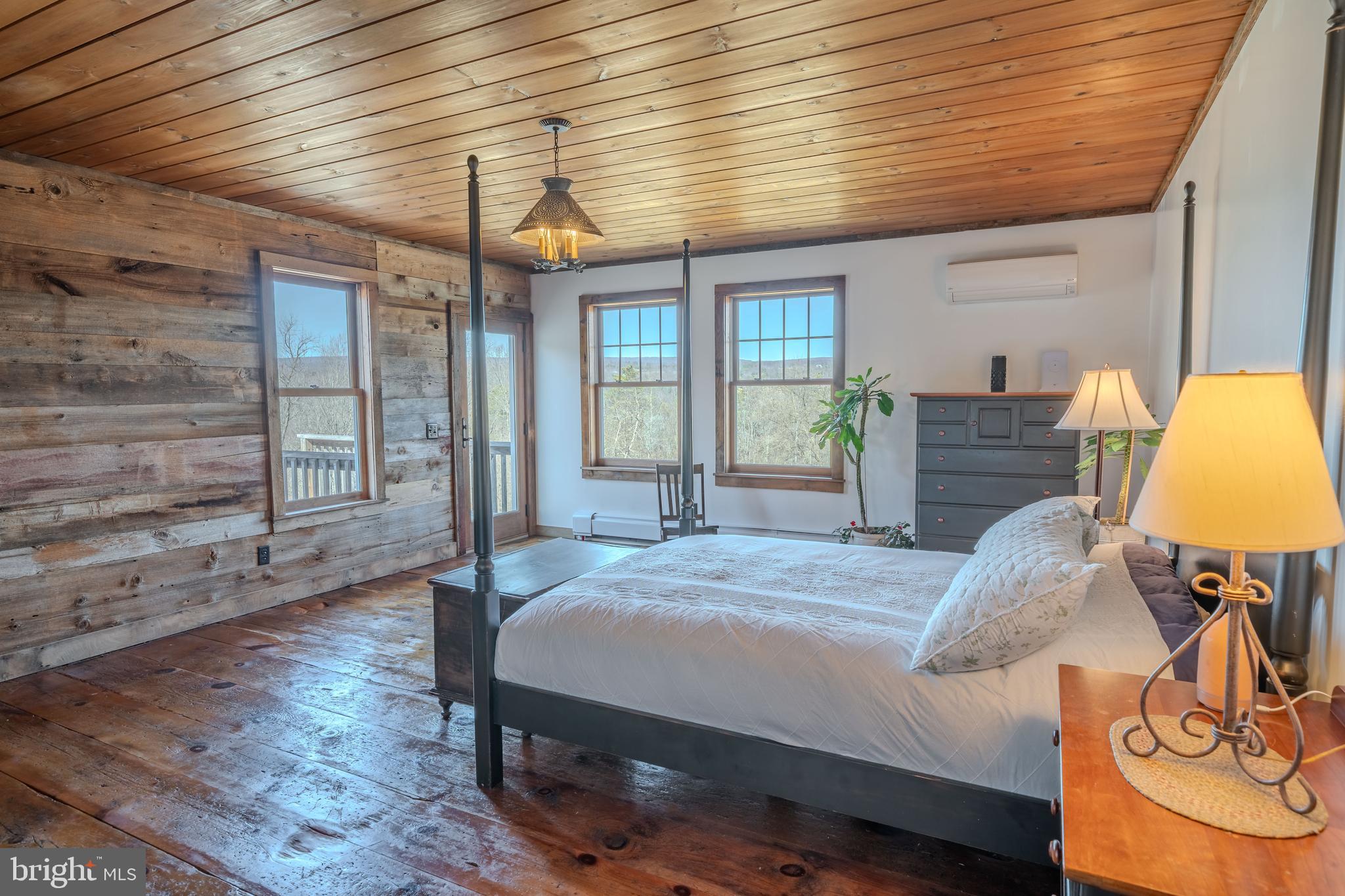 651 Robinson Road Newport, PA 17074 - Photo 29 of 87 a bed room with a bed and a chair