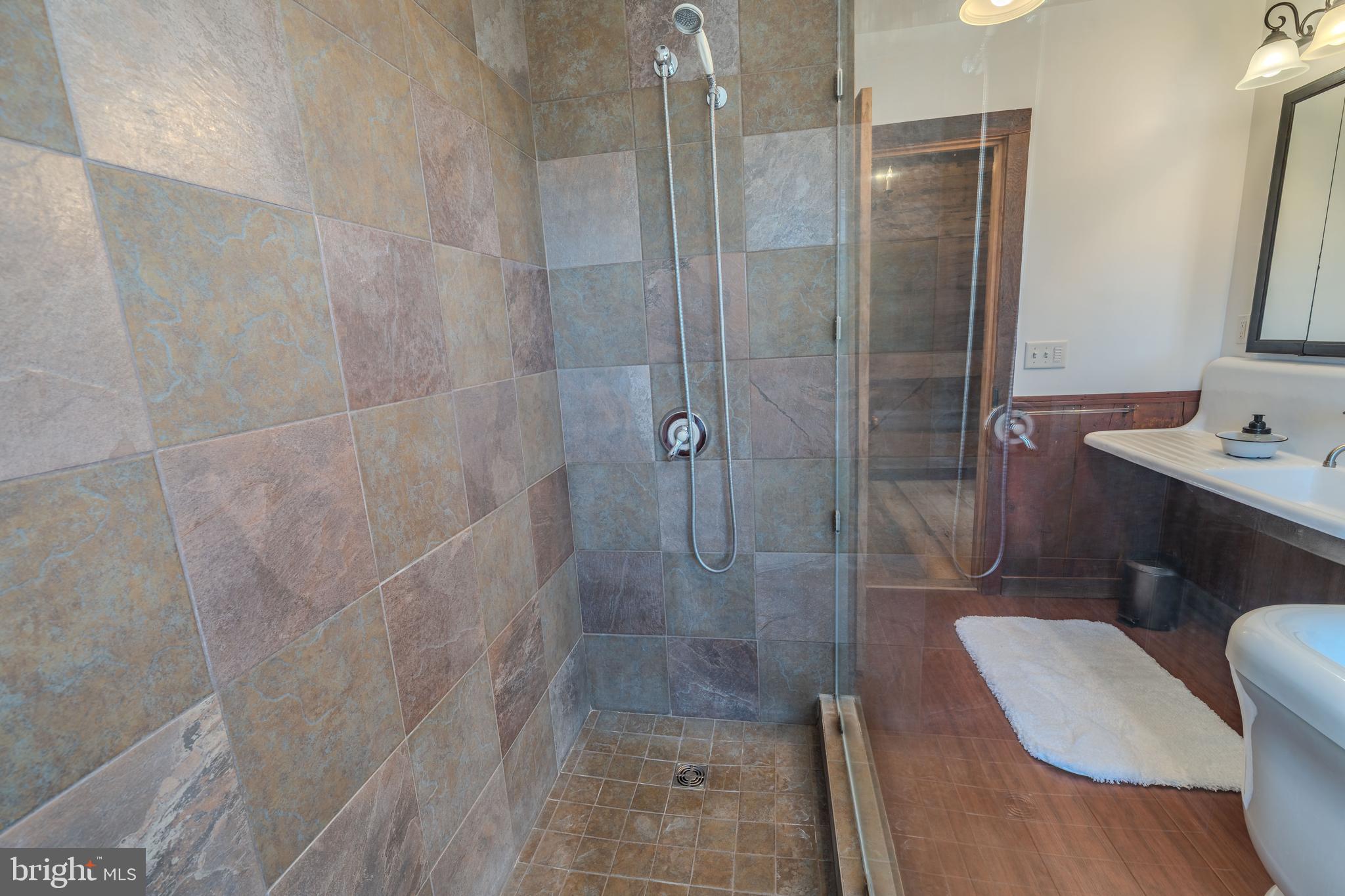651 Robinson Road Newport, PA 17074 - Photo 37 of 87 a bathroom with a shower a toilet and sink