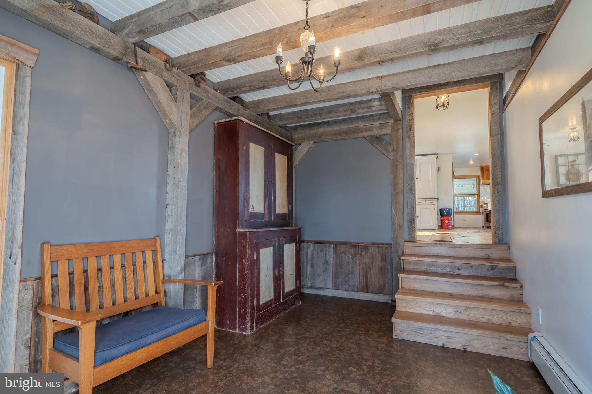 651 Robinson Road Newport, PA 17074 - Photo 46 of 87 a view of entryway with stairs and a chandelier