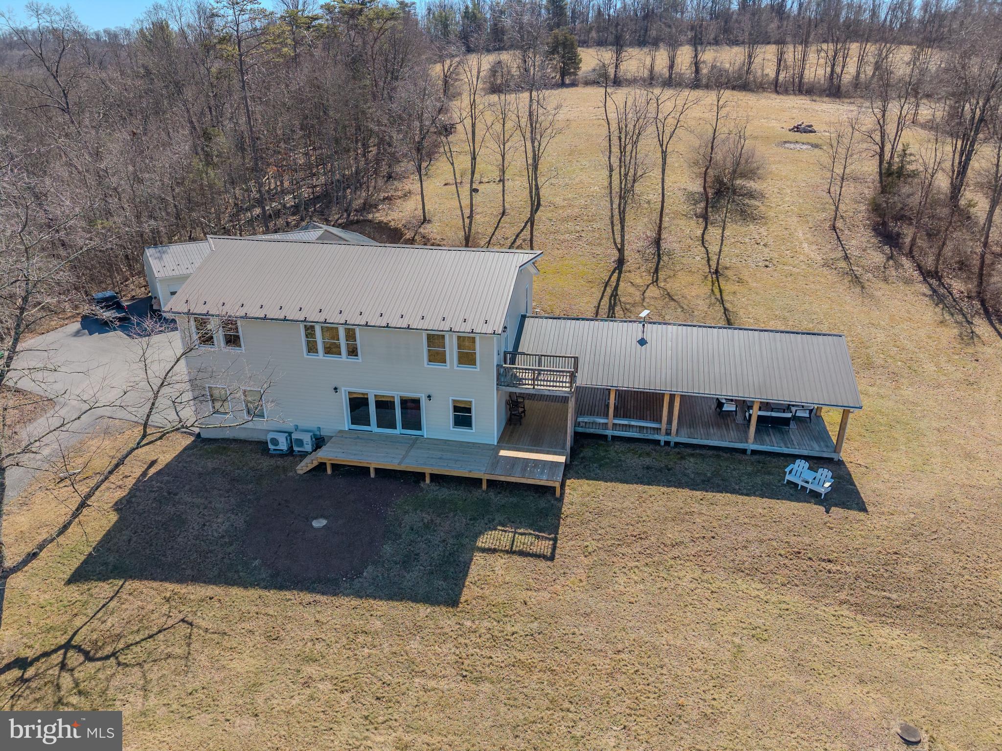 651 Robinson Road Newport, PA 17074 - Photo 62 of 87 a view of a house with a yard and sitting area