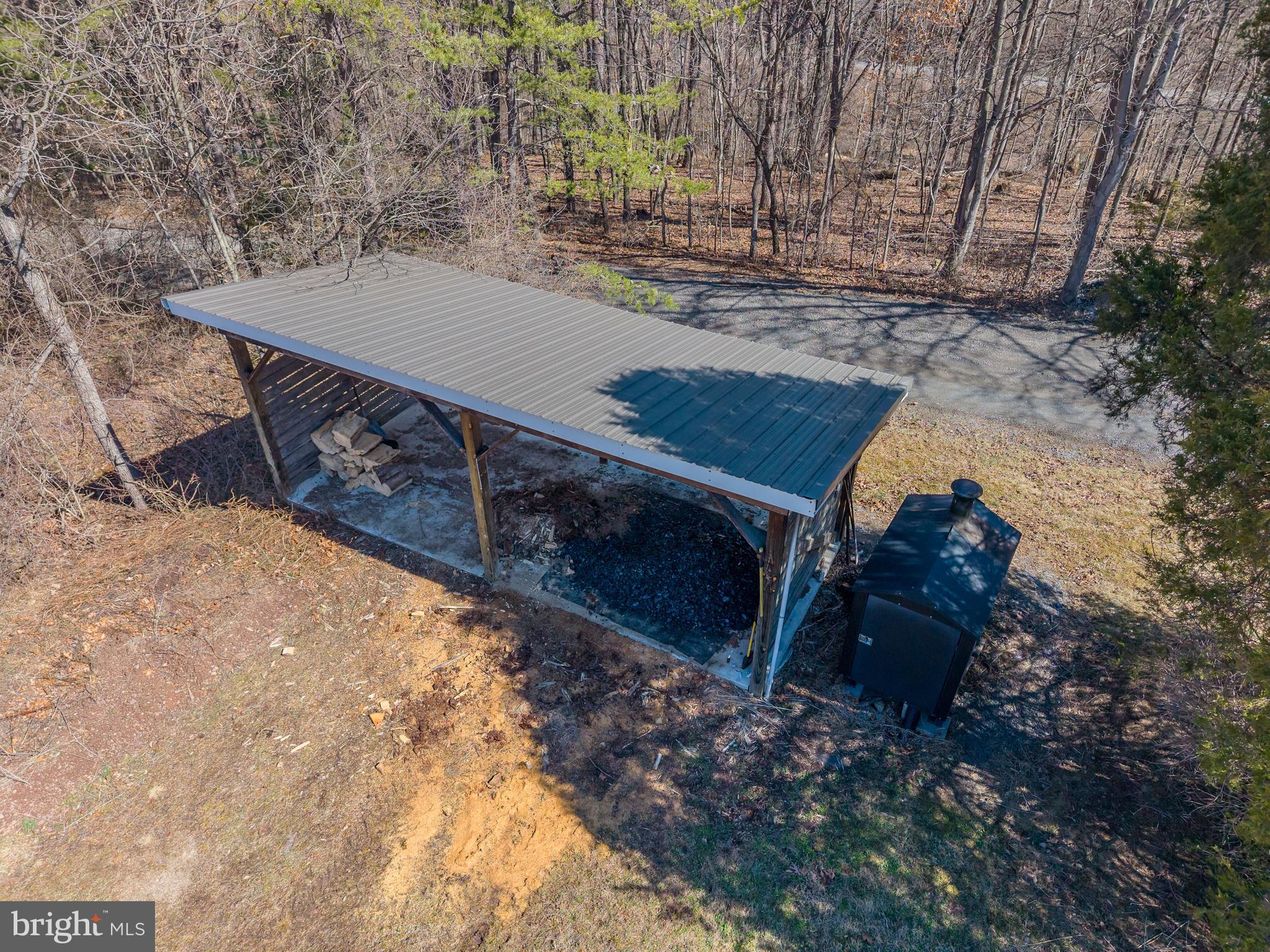 651 Robinson Road Newport, PA 17074 - Photo 65 of 87 a view of a backyard with chairs and a bed