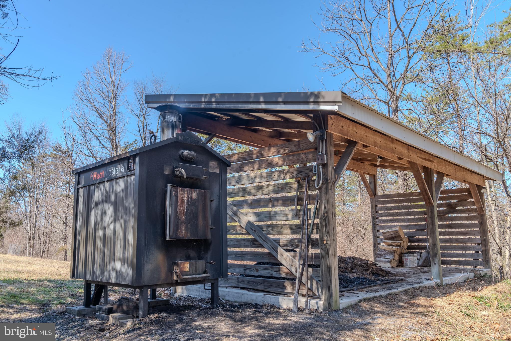 651 Robinson Road Newport, PA 17074 - Photo 66 of 87 a view of backyard with wooden fence and large trees