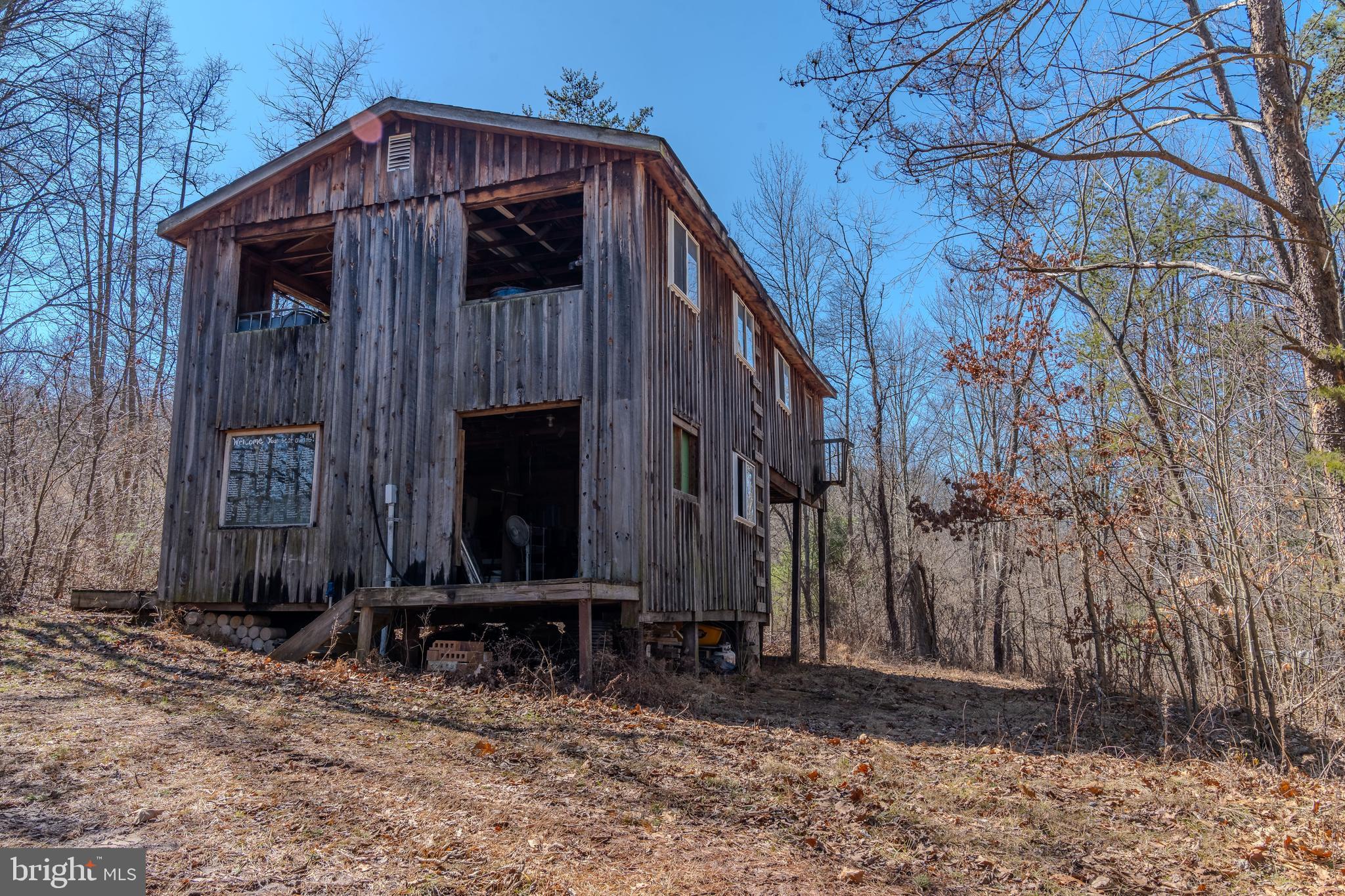 651 Robinson Road Newport, PA 17074 - Photo 67 of 87 a view of a house with a small yard and wooden fence