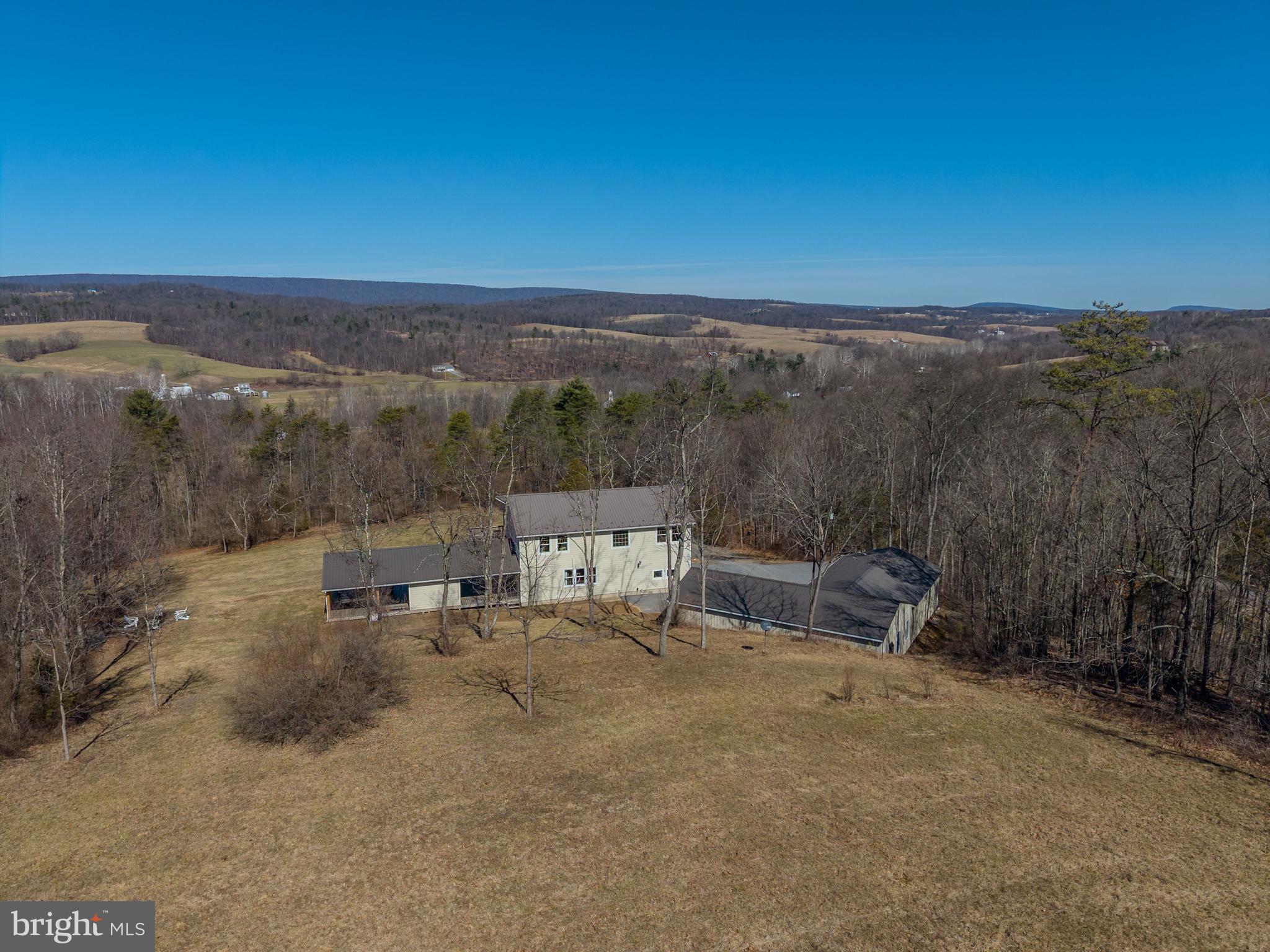651 Robinson Road Newport, PA 17074 - Photo 77 of 87 a view of a terrace with a bench