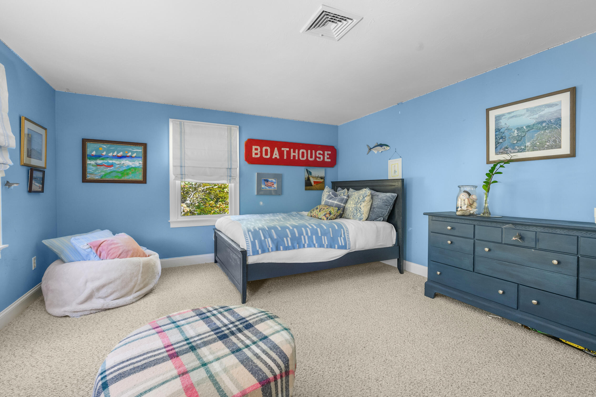 250 The Plains Road West Barnstable, MA 02668 - Photo 22 of 44 a bedroom with a bed and painting on the wall