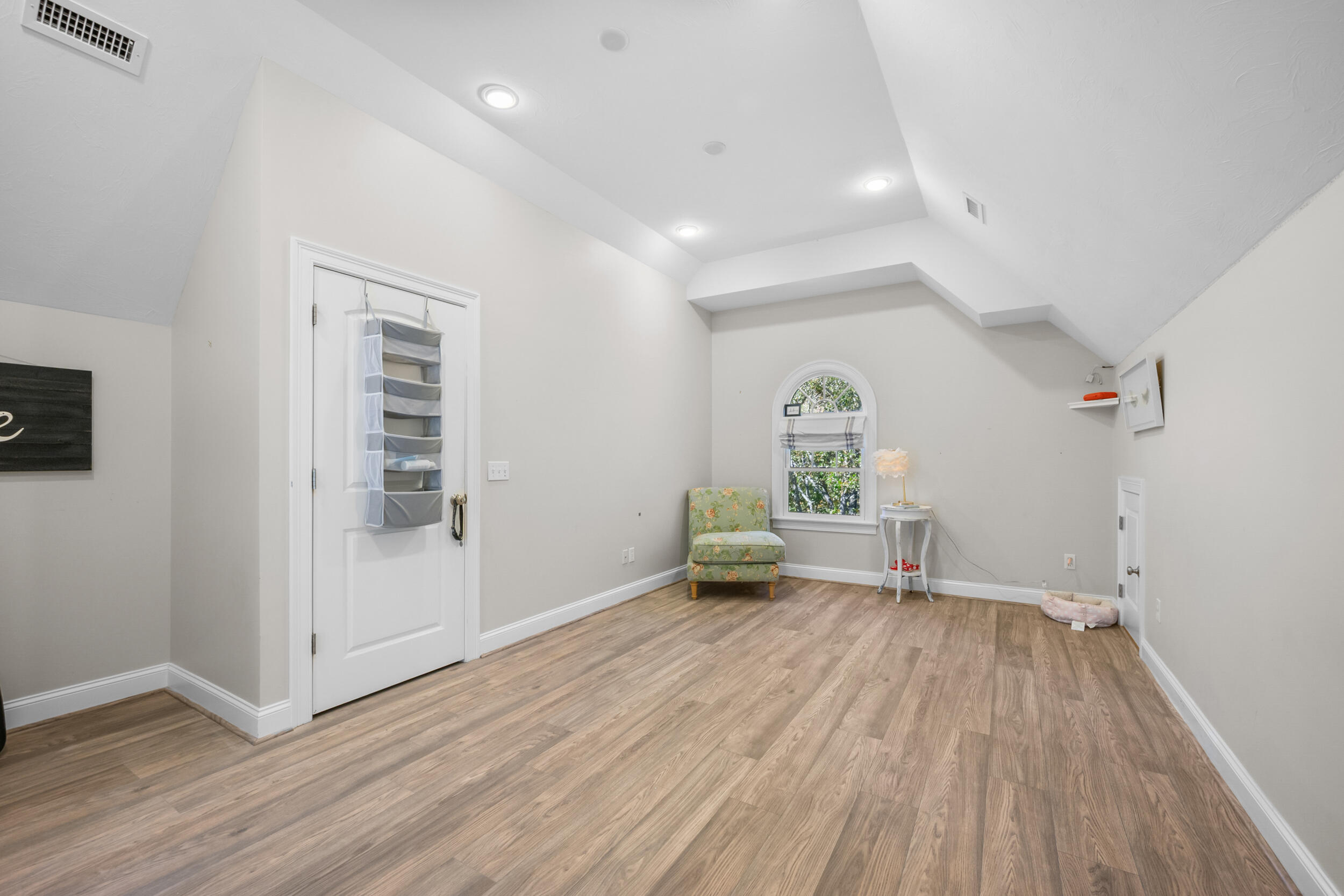 250 The Plains Road West Barnstable, MA 02668 - Photo 26 of 44 wooden floor in an empty room with a window