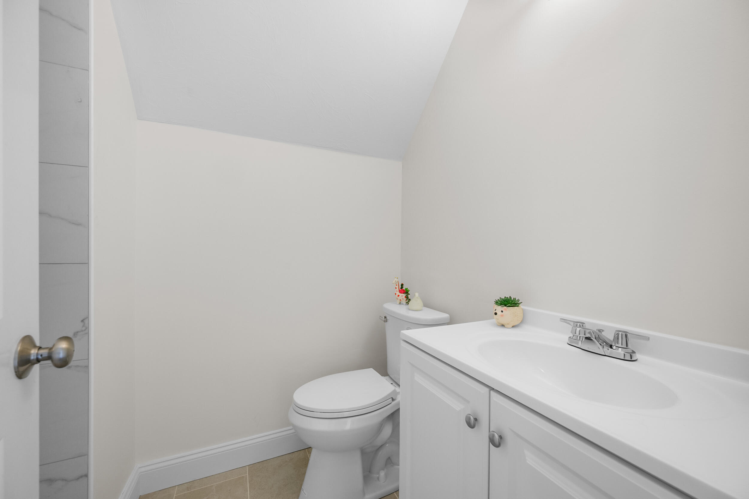 250 The Plains Road West Barnstable, MA 02668 - Photo 27 of 44 a bathroom with a sink and toilet