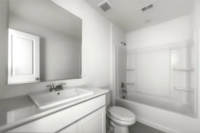 a bathroom with a sink toilet tub and shower
