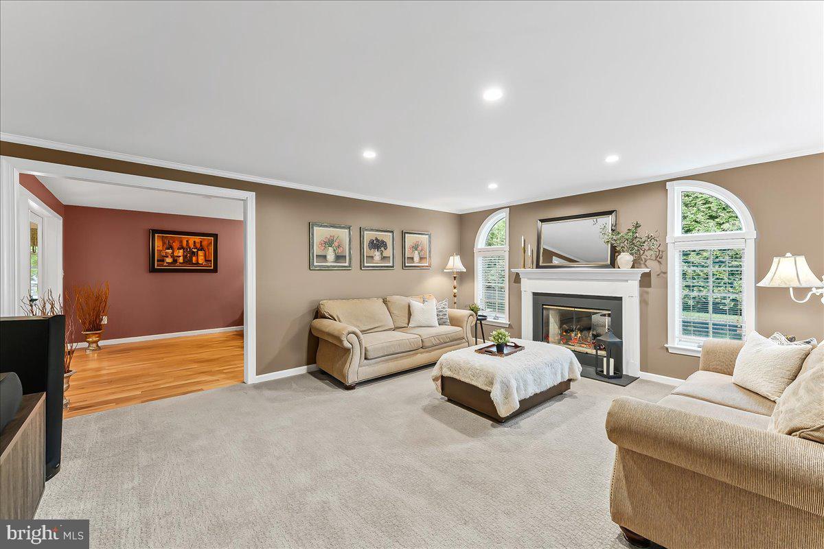 780 Tannery Drive Wayne, PA 19087 - Photo 14 of 59 a living room with furniture fireplace and a large window