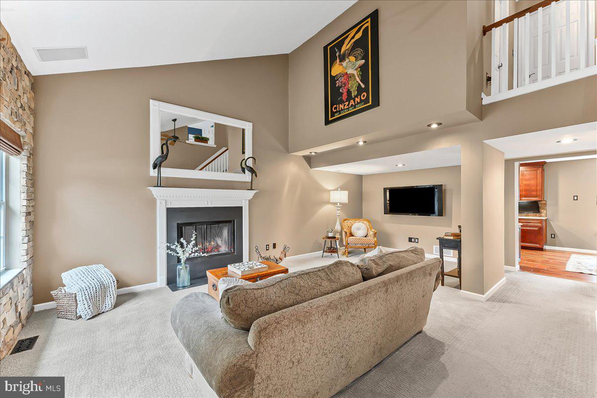 780 Tannery Drive Wayne, PA 19087 - Photo 6 of 59 a living room with furniture and a fireplace