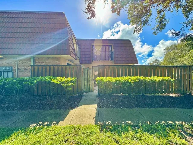 a view of a back yard of the house