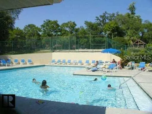 a view of a lake with a yard