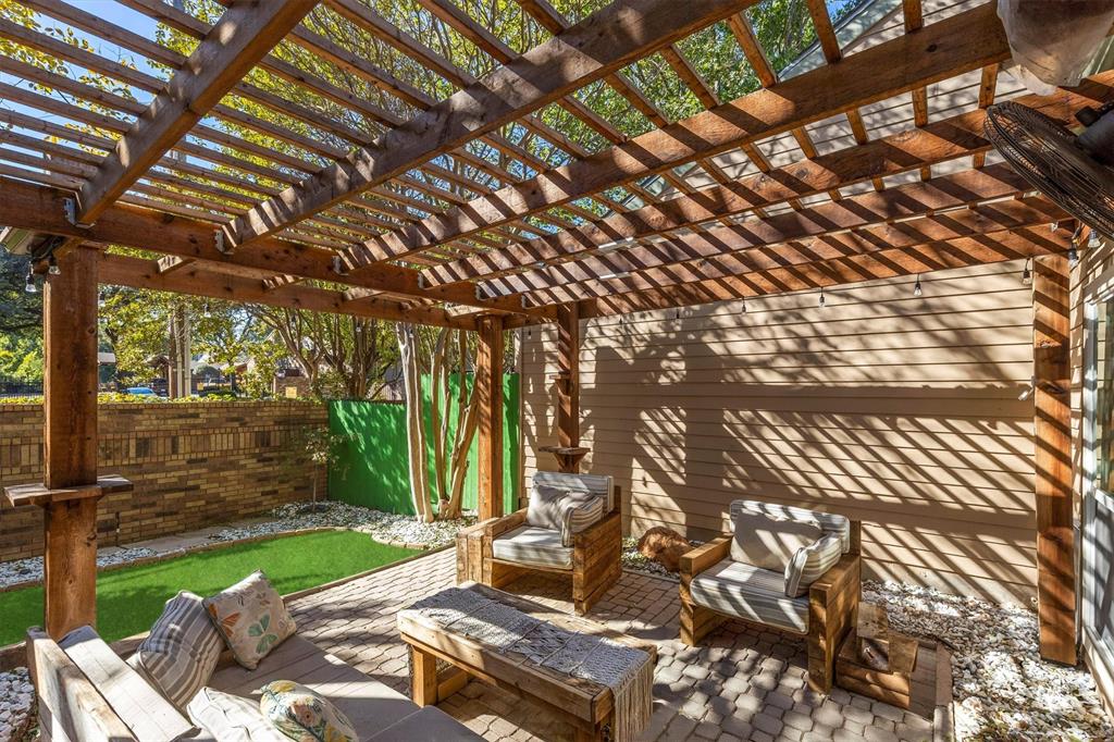 5565 Preston Oaks Road, Unit 136 Dallas, TX 75254 - Photo 30 of 40 a view of backyard with a garden and outdoor seating