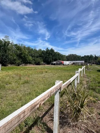 a view of a lake with a garden