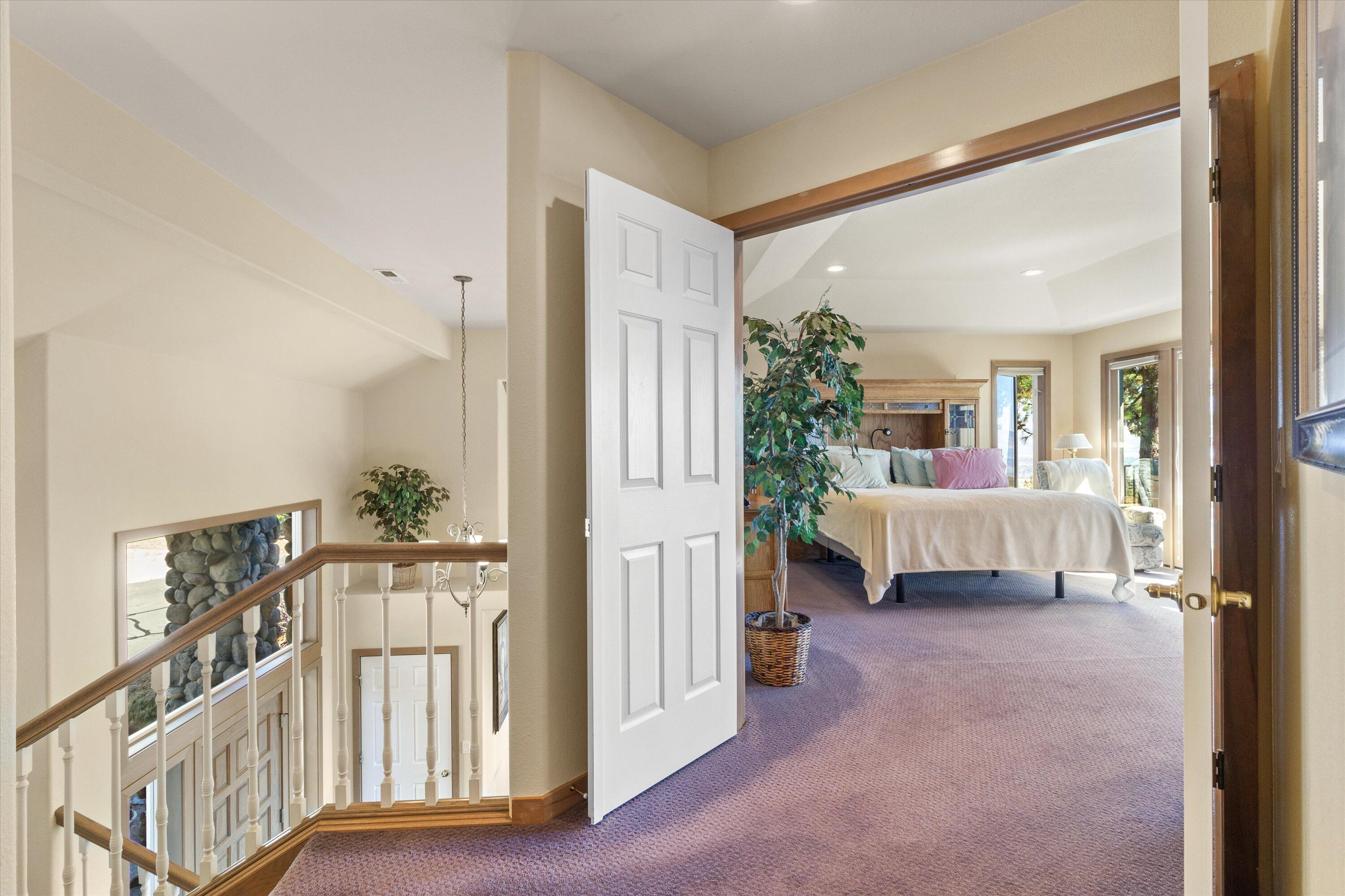 2801 Old Military Road Central Point, OR 97502 - Photo 21 of 49 a view of a bedroom with furniture and windows