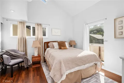a bathroom with a sink vanity toilet and shower