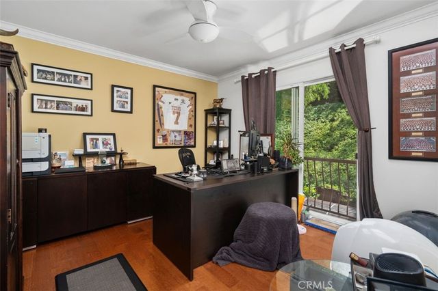 an outdoor space with patio the couches and chairs under an umbrella